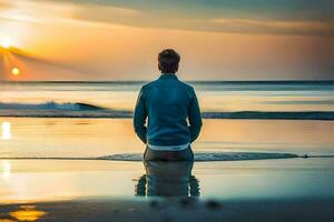 un hombre sentado en el playa a puesta de sol. generado por ai foto