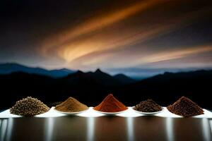 spices in a row on a table with mountains in the background. AI-Generated photo