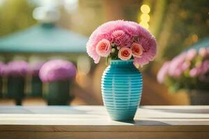 a blue vase with pink flowers sitting on a table. AI-Generated photo