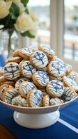 Nautical theme with blue and white decor, anchor, and sailboat cookies photo