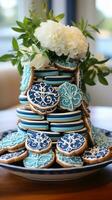 Nautical theme with blue and white decor, anchor, and sailboat cookies photo