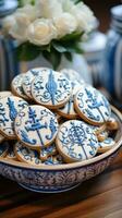 Nautical theme with blue and white decor, anchor, and sailboat cookies photo