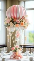 Whimsical hot air balloon centerpiece with flowers and ribbons photo