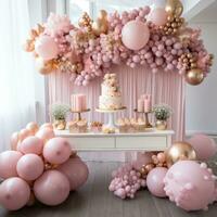 Cozy pink and gold setup with floral accents and desserts photo