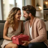 Woman receives a jewelry box as a romantic gift from her partner photo