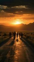 el libertad de el abierto camino, ciclistas en un puesta de sol la carretera - espalda ver vertical móvil fondo de pantalla ai generado foto