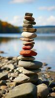Coastal cairn Stones arranged in a seaside pyramid, a tranquil and natural monument Vertical Mobile Wallpaper AI Generated photo