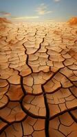 Deserts plight Cracked, parched soil reflects climate changes harsh impact on land Vertical Mobile Wallpaper AI Generated photo