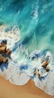Elegant shoreline Top view captures soft ocean wave on sandy beachs beauty Vertical Mobile Wallpaper AI Generated photo