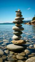 Nautical formation Sea kissed stones stacked into a pyramid along the shore Vertical Mobile Wallpaper AI Generated photo