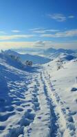 Nevado ascenso humano huellas marca ladera escalada en tranquilo invierno paisaje vertical móvil fondo de pantalla ai generado foto