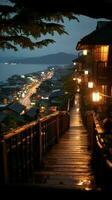 View from wooden plank above phuket town at night Vertical Mobile Wallpaper AI Generated photo