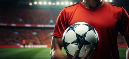 Soccer player in red team jersey holds ball, stadiums focal point AI Generated photo