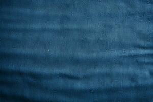 Texture of blue jeans fabric, a rugged and timeless backdrop AI Generated photo