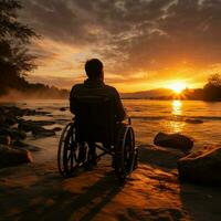 Silhouetted wheelchair user, against a vibrant sunset, epitomizing resilience and strength For Social Media Post Size AI Generated photo