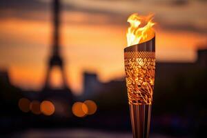 a lit torch in front of the iconic Eiffel Tower photo
