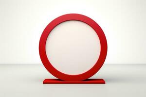 a red round object on a white table photo