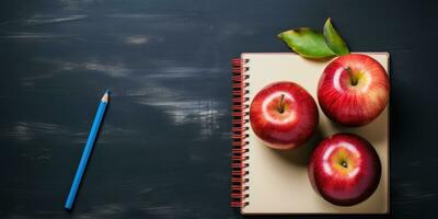 espacio para texto, espalda a escuela. bloc y manzana en el mesa. generativo ai foto