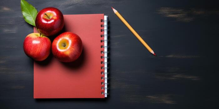 Space for text, back to school. Notepad and apple on the table. Generative AI photo