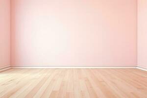 An empty room with pink walls and wooden floors photo