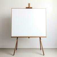 an empty easel with a blank canvas ready for creation photo