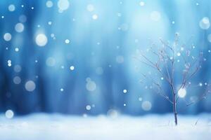 A solitary tree standing tall in a winter wonderland photo