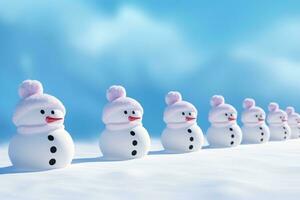 A row of snowmen standing in the snow photo