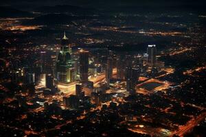 A cityscape illuminated at night from an aerial perspective photo