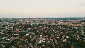 Flying over Vilnius, over the Zhirmunai district to downtown and the city center video