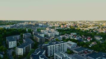 Old and new residential buildings area in the city of Vilnius. Aerial camera view video