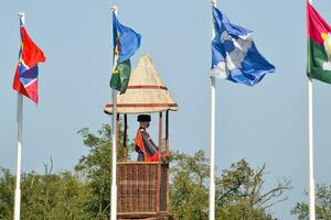 Number of different flags with coats of arms and banners photo