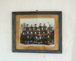 Photos of the Cossacks and Cossack family on the whitewashed wall. Ethnic and Cultural Museum.