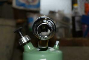 Blowtorch, general view. Blowtorch a with a green tank photo