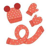 Winter red knitted hat with pompoms, scarf and mittens with heart pattern. Cartoon flat vector illustration