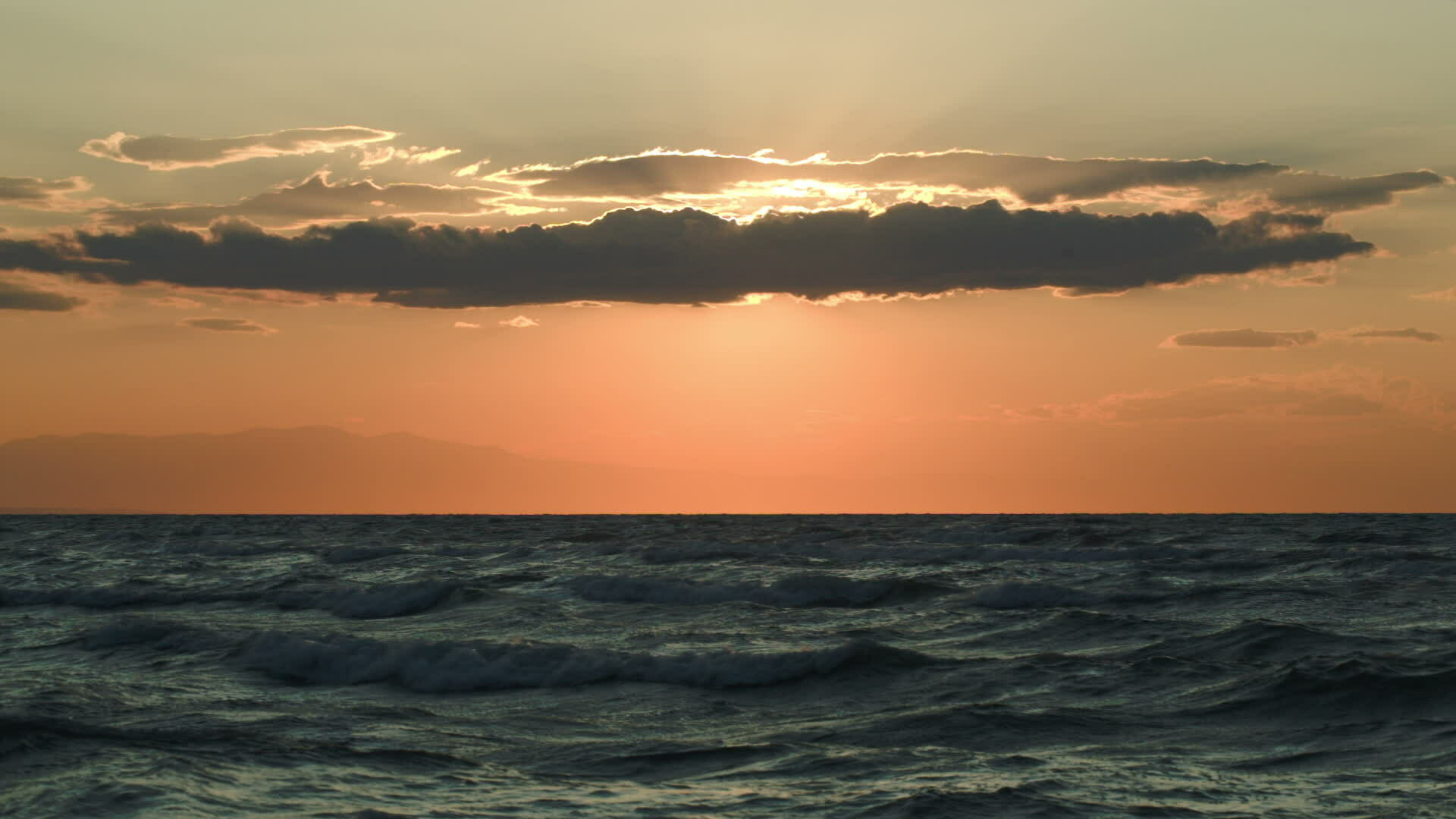 Rough sea and evening sun hidden with cloud 30339257 Stock Video at