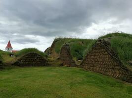 Glaumbaer, a group of turf houses dating from the late 1800s, which reproduce a building style used for centuries in Iceland photo