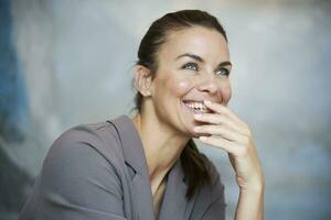 Portrait of happy brunette businesswoman photo