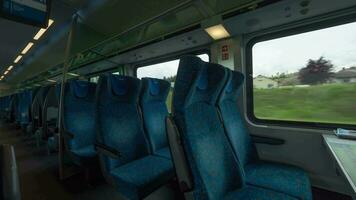 Time lapse shot inside of modern empty train wagon with table, seat places and windows, Vienna, Austria video