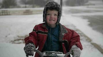 Young Boy Playing In Snow On Christmas Day video