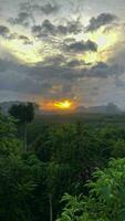 The sun rises at dawn at the Din Daeng Doi viewpoint. Krabi Province, Thailand video