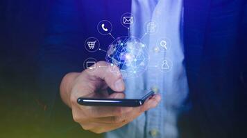 Businessman touching Global network connection digital business hologram on smartphone, Big data analytics and business intelligence concept, Infograph, technology. photo