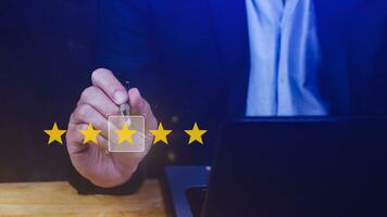 5 star rating. Businessman customer giving five star rating, Review, Service rating, Satisfaction, Customer service experience and feedback review satisfaction. photo