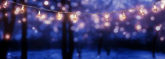 Light string isolated on blue and violet blur backgrounds. AI generated photo