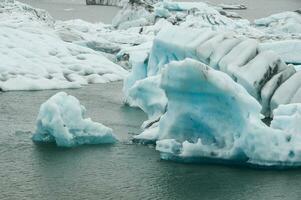 Icebergs in Jokulsarlon, a glacial lake in Iceland photo