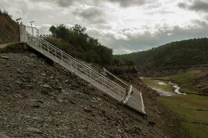 The Ponsul River is a affluent of the Tejo River, in Portugal, and is a very large river. At this time it is completely dry, without water and with its bed cracked due to climate change photo