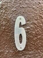 Number 6 on the wall of the building photo