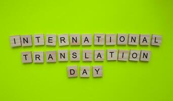 September 30, International Translation Day, minimalistic banner with the inscription in wooden letters photo
