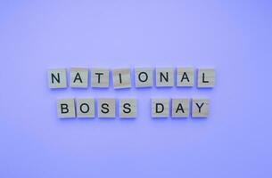 October 16, National Boss Day, minimalistic banner with the inscription in wooden letters photo