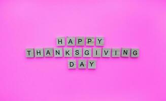 October 9, happy Thanksgiving Day, minimalistic banner with the inscription in wooden letters photo