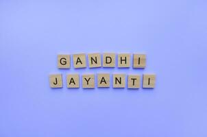 October 2, Gandhi Jayanti, minimalistic banner with wooden letters photo